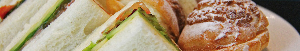 Eating Sandwich at Super Sandwich restaurant in Shelton, CT.